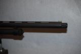 Savage 320, 12 gauge. home defense shotgun - 2 of 5