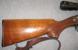 Remington 1100 12GA w/ Swift 4X40 and Smooth Barrel - 5 of 10