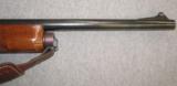 Remington 1100 12GA w/ Swift 4X40 and Smooth Barrel - 2 of 10