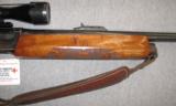 Remington 1100 12GA w/ Swift 4X40 and Smooth Barrel - 3 of 10