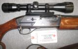 Remington 1100 12GA w/ Swift 4X40 and Smooth Barrel - 4 of 10