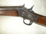 Remington Arms Co.
.22 LR rolling block single shot rifle - 1 of 6