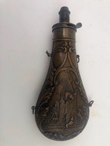 Large Antique Powder Flask Depicting 3 Dogs and A Man Hunting Bear In Hollow Tree - 1 of 7