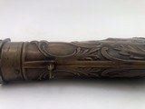Large Antique Powder Flask Depicting 3 Dogs and A Man Hunting Bear In Hollow Tree - 5 of 7