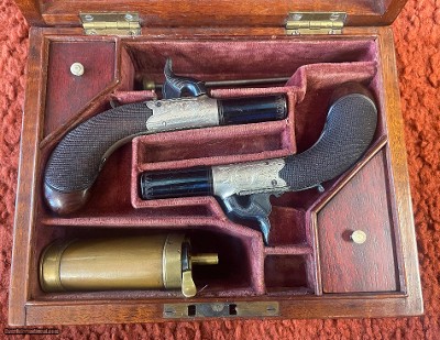 Cased Pair Of "J. Williams London " Muff Pistols