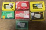 7 boxes of 6MM bullets total count 400 some boxes are partial