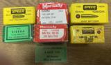 7 boxes of 6MM bullets total count 400 some boxes are partial - 2 of 2