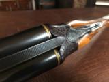 Winchester Model 21 - 20 Gauge - Tournament Skeet Grade - Super Custom Upgrade - WS1-2 Chokes - 26” barrels - Stright Grip - Checkered Butt - WOOD!!
- 19 of 25