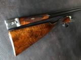 G.E. Lewis BLE - 28 GA - 28” Barrels - IC/Mod - 14 1/2 X 1 3/8 X 2 1/8 - 5 lbs 10 ozs - Single Trigger - Checkered Butt - Case Colored English Scroll - 12 of 24
