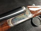 G.E. Lewis BLE - 28 GA - 28” Barrels - IC/Mod - 14 1/2 X 1 3/8 X 2 1/8 - 5 lbs 10 ozs - Single Trigger - Checkered Butt - Case Colored English Scroll - 1 of 24