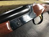 *SOLD*Winchester Model 23 Classic - .410 - 3” - 26” Barrels - M/F Chokes - 14 9/16 X 1 5/16 X 2 3/8 - 6 lbs. 4 ozs. - Winchester Classis Case & Keys
- 14 of 25