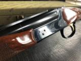 *SOLD*Winchester Model 23 Classic - .410 - 3” - 26” Barrels - M/F Chokes - 14 9/16 X 1 5/16 X 2 3/8 - 6 lbs. 4 ozs. - Winchester Classis Case & Keys
- 16 of 25