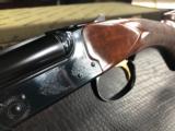 *SOLD*Winchester Model 23 Classic - .410 - 3” - 26” Barrels - M/F Chokes - 14 9/16 X 1 5/16 X 2 3/8 - 6 lbs. 4 ozs. - Winchester Classis Case & Keys
- 17 of 25