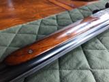 *SALE PENDING*Merkel 203-E - 16 gauge - SST - Hand Detachable Sidelock Ejector - Solid Rib - Hand Engraved - 3 Piece Forend - Hand Carved Stock Grip - 18 of 24