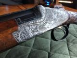 *SALE PENDING*Merkel 203-E - 16 gauge - SST - Hand Detachable Sidelock Ejector - Solid Rib - Hand Engraved - 3 Piece Forend - Hand Carved Stock Grip - 2 of 24