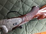 *SALE PENDING*Merkel 203-E - 16 gauge - SST - Hand Detachable Sidelock Ejector - Solid Rib - Hand Engraved - 3 Piece Forend - Hand Carved Stock Grip - 15 of 24