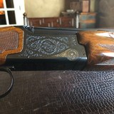 Classic Doubles 101 Field - 20ga - 25 1/2 Barrels - Screw in Chokes - Adjustable Trigger - Feathercrotch Walnut - 13 1/2 x 1 1/2 x 2 3/8 x 6 lbs 8 ozs - 18 of 20