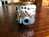 Colt Python .357 Magnum - Master Engraver Robert Valade - 4” - Nickel -
Deep Western Scroll Engraving - Like New - 14 of 25