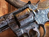 Colt Python .357 Magnum - Master Engraver Robert Valade - 4” - Nickel -
Deep Western Scroll Engraving - Like New - 17 of 25