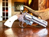 Colt Python .357 Magnum - Master Engraver Robert Valade - 4” - Nickel -
Deep Western Scroll Engraving - Like New - 3 of 25
