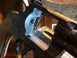 Colt Python .357 Magnum - Master Engraver Robert Valade - 4” - Nickel -
Deep Western Scroll Engraving - Like New - 13 of 25