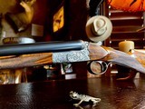 F.lli. Rizzini R2E High Grade BLE - 28ga - Italian Deep Relief by Master Engraver W. Patelli - 27.5” Barrels - IC/IM Chokes - Nizzoli Cased - 9 of 25