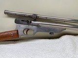 Quackenbush "22 Safety cartridge rifle"
W/ rare Malcolm scope - 1 of 15