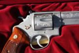 Smith & Wesson engraved model 629 stainless steel
- 2 of 6