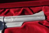 Smith & Wesson engraved model 629 stainless steel
- 3 of 6