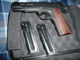 Sig-Sauer 1911-22
22LR semi=auto pistol - 1 of 5