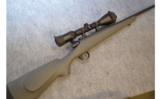Remington LH 700 KS w/ Swarovski Scope .300 RUM - 1 of 9