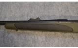 Remington 700
XCR II
~
.375 H&H Magnum - 6 of 9