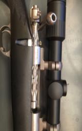 Lazzeroni Global Hunter in 308 war bird, Leupold scope 3.5X14X50mm, 30 mm - 1 of 12
