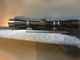 Weatherby Rifle Mark V light weight in 308, stainless steel, with Leupold Var XII 3X9 X50 scope - 3 of 9