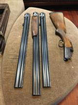 Beretta BL4 12 Guage shotgun with 3 barrels and a Browning old case - 14 of 15