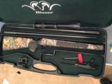 Blaser R93 with two barrels 300 win mag/375, two muzzle break, Professional stock, Swarovski Scope, and case - 2 of 7