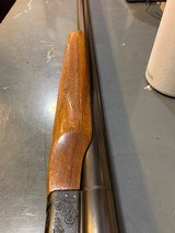 Ithaca 200 E side by side shotgun, 26 inch barrel, hi condition, used little with wrap around wood - 2 of 15