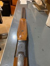 Ithaca 200 E side by side shotgun, 26 inch barrel, hi condition, used little with wrap around wood - 11 of 15