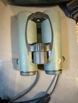 Swarovski EL 8.5X42 binocular, like new condition with swarovski case