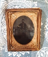 Quarter plate tintype of armed Cavalry sergeant