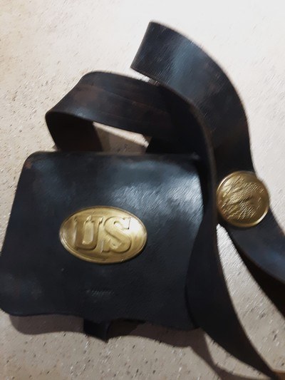 Original Civil War cartridge box, sling, and plates with soldiers name.