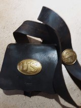 Original Civil War cartridge box, sling, and plates with soldiers name.