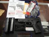 Smith & Wesson Performance Center 9MM Luger Ported- 4 of 4