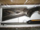 Browning SA-22. Semi Auto. NIB. Stainless Steel Octagon. Gray Laminate
- 2 of 4