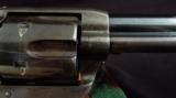 079-0916-3095, Colt SA Frontier Six Shooter, 75% deep overall blue, crisp excellent grips. 60% rainbow hues,
- 15 of 15