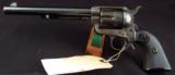 079-0916-3095, Colt SA Frontier Six Shooter, 75% deep overall blue, crisp excellent grips. 60% rainbow hues,
- 8 of 15