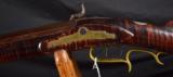 079-0917-5029 Engraved Virginia Style Long Rifle Carved and Silver Inlaid stock. It is .38 cal percussion with tiger striped maple stock. - 3 of 11