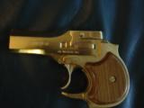 High Standard Derringer,22 Magnum,rare Gold Plated Presentation model,2 shots,in wood fitted Pres case with papers,made in 1978 - 1 of 11