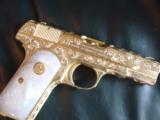 Colt 1903. hammerless 32auto,master engraved by Jeff Flannery,& 24K gold plated,made in 1920,MOP grips,one of a kind masterpiece - 2 of 12