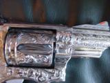 Smith & Wesson 66-4,Jeff Flannery master engraved,100%+coverage,polished stainless MOP grips,357 Mag,2 1/2